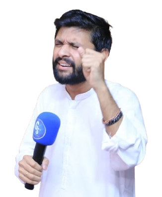 Evangelist Daud Ayub preaching with a microphone